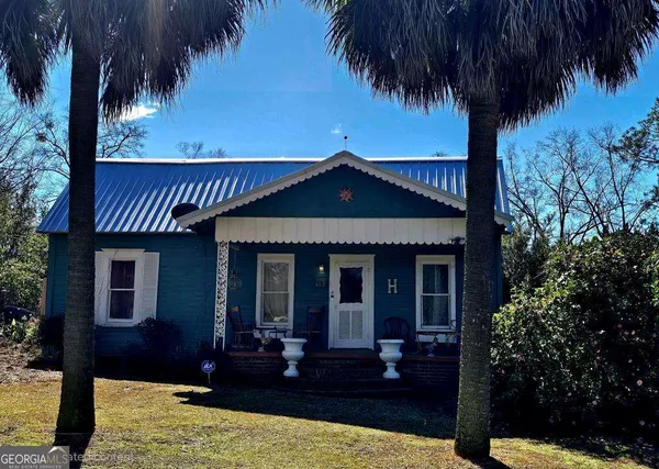 a view of a house with a patio