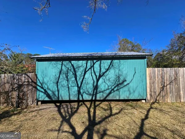 a view of a street sign on a balcony