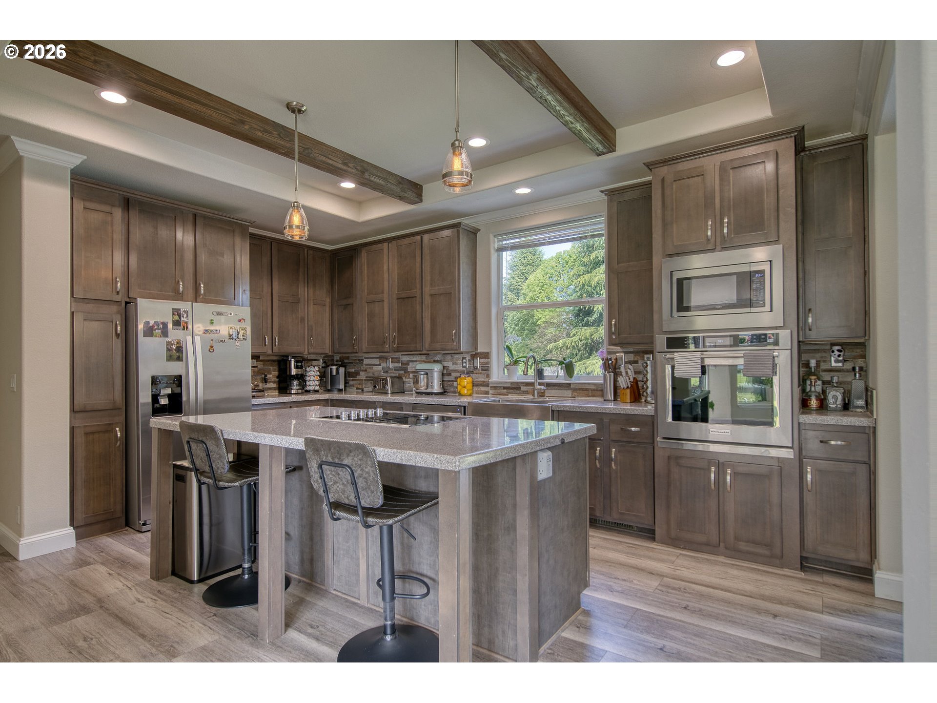 55635 Fullerton Road Warren, OR 97053 - Photo 11 of 42 a kitchen with kitchen island a sink stove and refrigerator