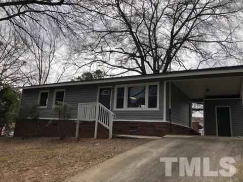 924 Seabrook Road Raleigh, NC 27610 - Photo 2 of 10 a view of house house with a large tree