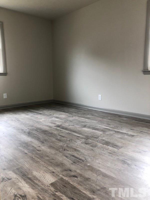924 Seabrook Road Raleigh, NC 27610 - Photo 6 of 10 a view of an empty room