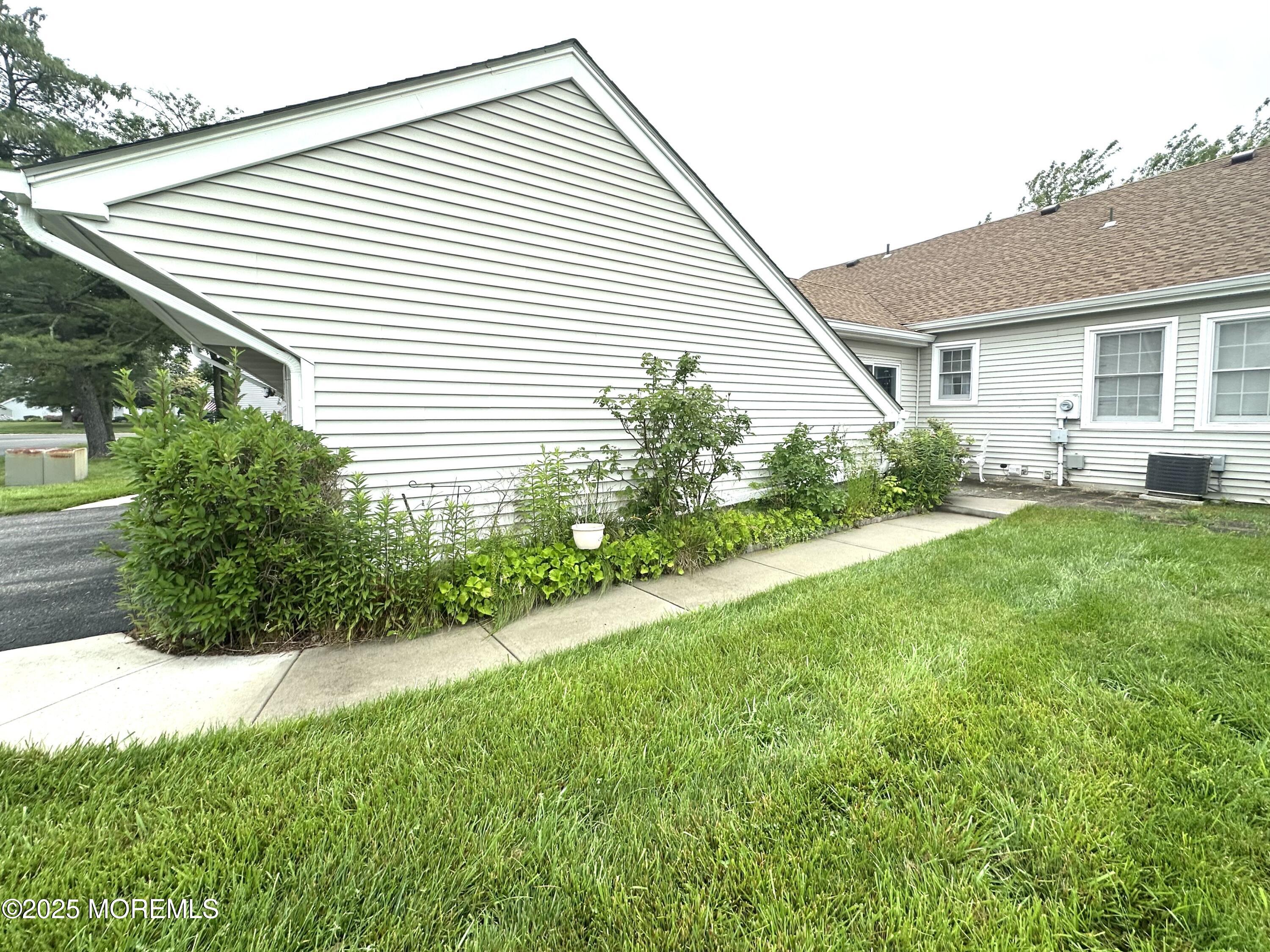 86 Jamestown Road, Unit C Freehold, NJ 07728 - Photo 29 of 32 Side