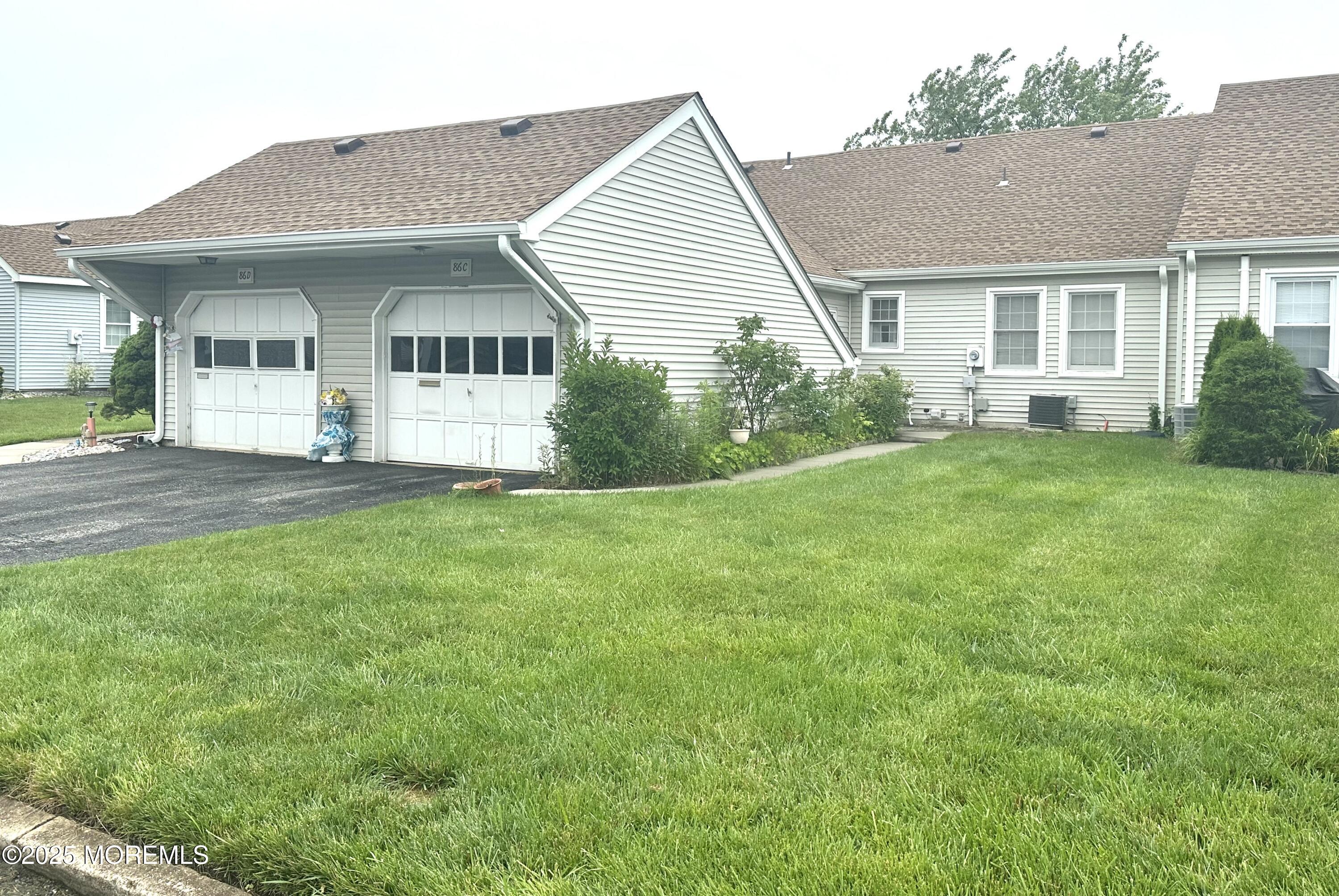 86 Jamestown Road, Unit C Freehold, NJ 07728 - Photo 31 of 32 Garage