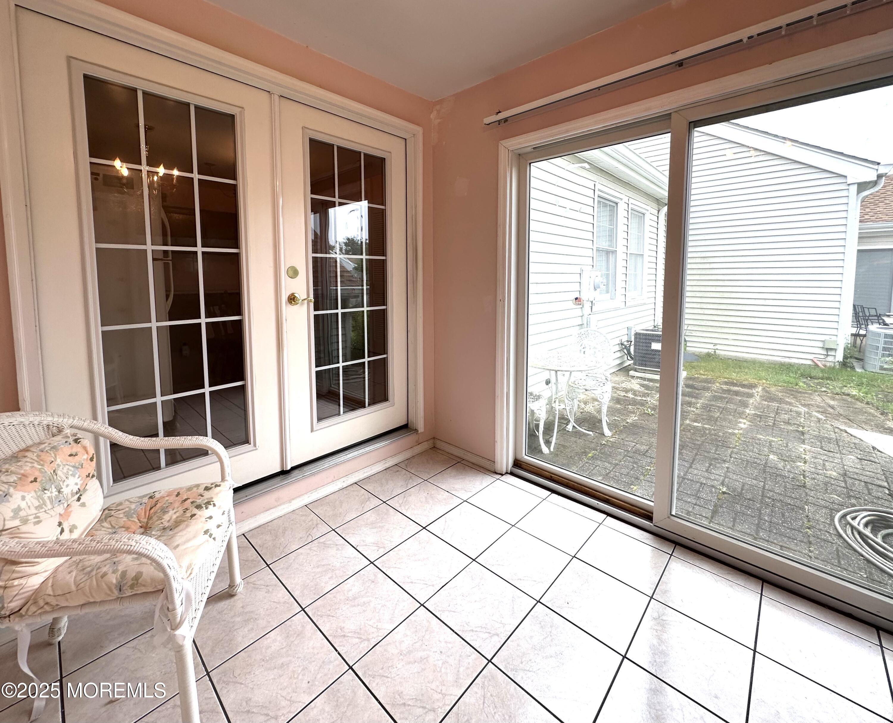 86 Jamestown Road, Unit C Freehold, NJ 07728 - Photo 6 of 32 Sunroom