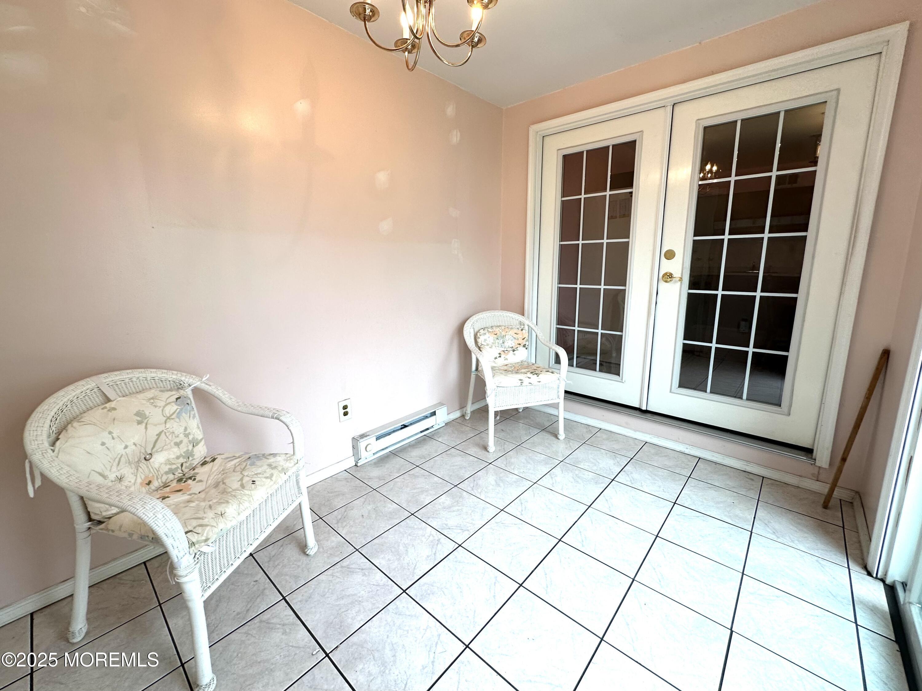 86 Jamestown Road, Unit C Freehold, NJ 07728 - Photo 7 of 32 Sunroom