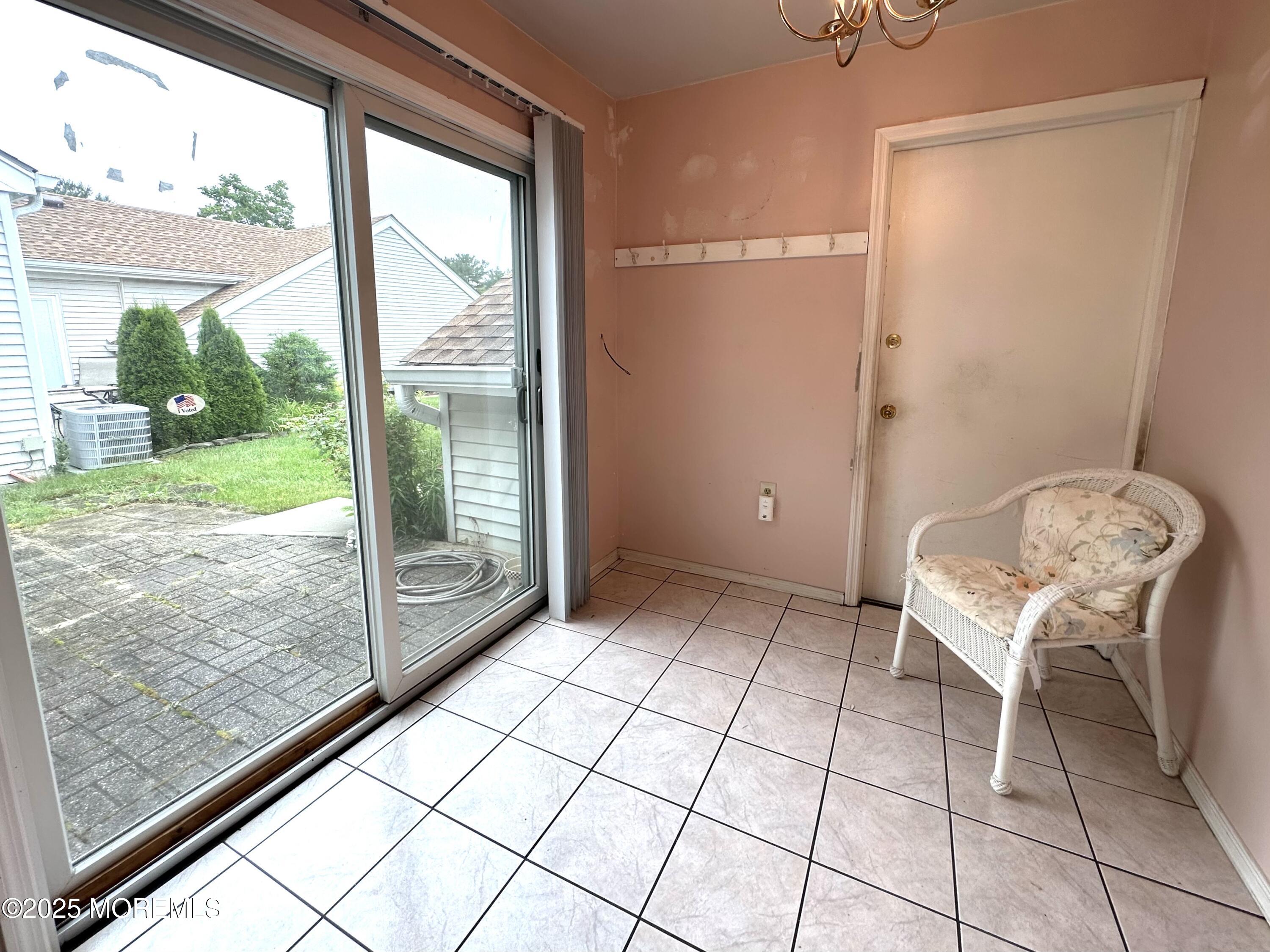 86 Jamestown Road, Unit C Freehold, NJ 07728 - Photo 8 of 32 Sunroom