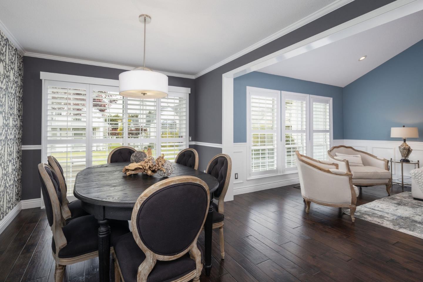 10 Merion Road Half Moon Bay, CA 94019 - Photo 12 of 39 a dining room with furniture a chandelier and wooden floor