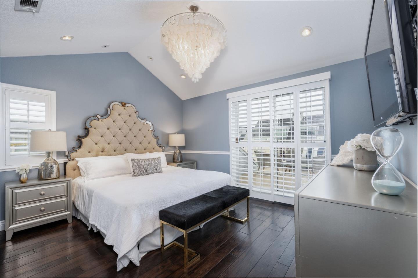 10 Merion Road Half Moon Bay, CA 94019 - Photo 18 of 39 a bedroom with a bed and wooden floor