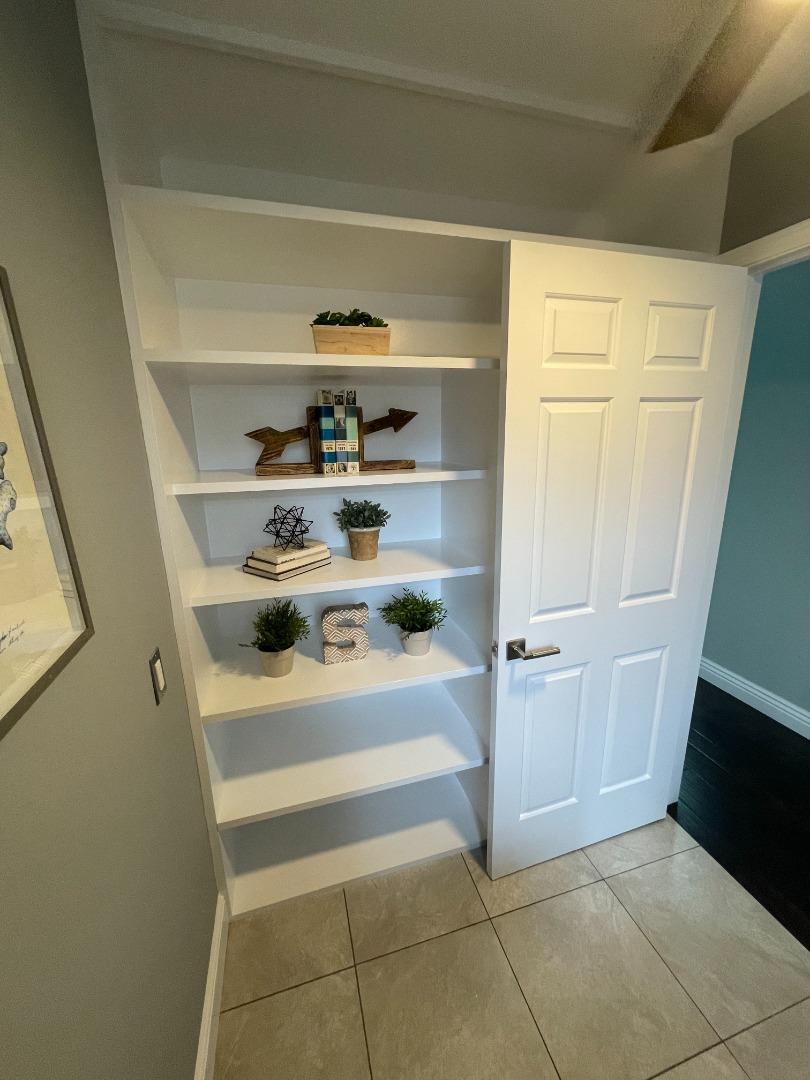 10 Merion Road Half Moon Bay, CA 94019 - Photo 23 of 39 a view of walk in closet with clothes and shoes