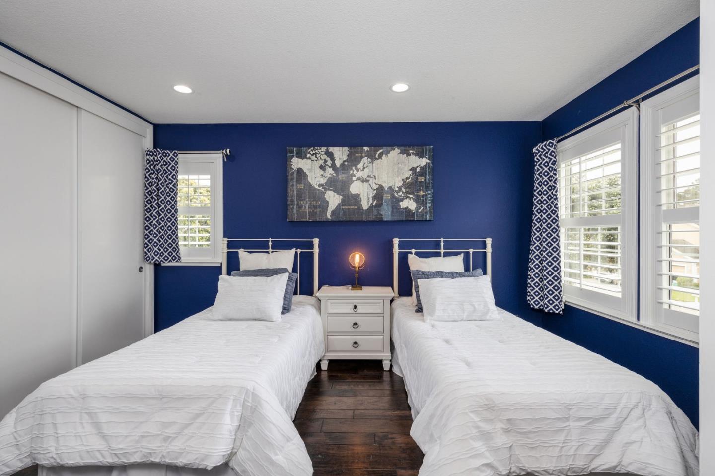 10 Merion Road Half Moon Bay, CA 94019 - Photo 24 of 39 a bedroom with a large bed and a large window