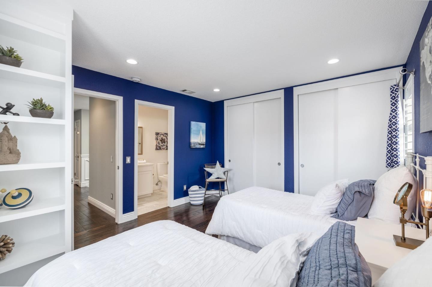 10 Merion Road Half Moon Bay, CA 94019 - Photo 25 of 39 a bedroom with a large bed and a dresser