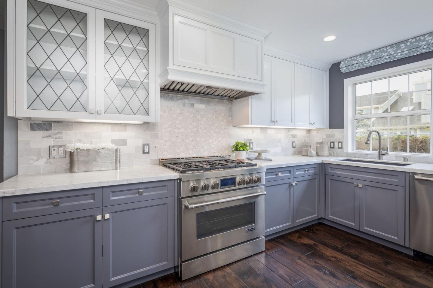 10 Merion Road Half Moon Bay, CA 94019 - Photo 7 of 39 a kitchen with cabinets a sink and appliances