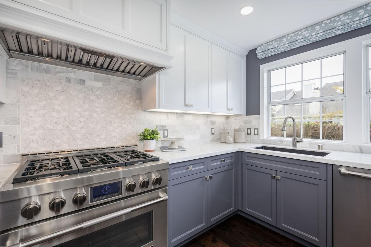 10 Merion Road Half Moon Bay, CA 94019 - Photo 8 of 39 a kitchen with granite countertop a sink stove and cabinets