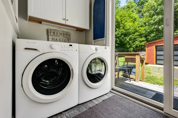 a utility room with dryer and washer