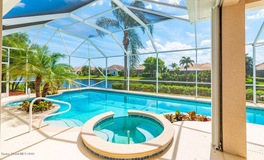4111 Stoney Point Road Melbourne, FL 32940 - Photo 21 of 42 Pool with Lake View