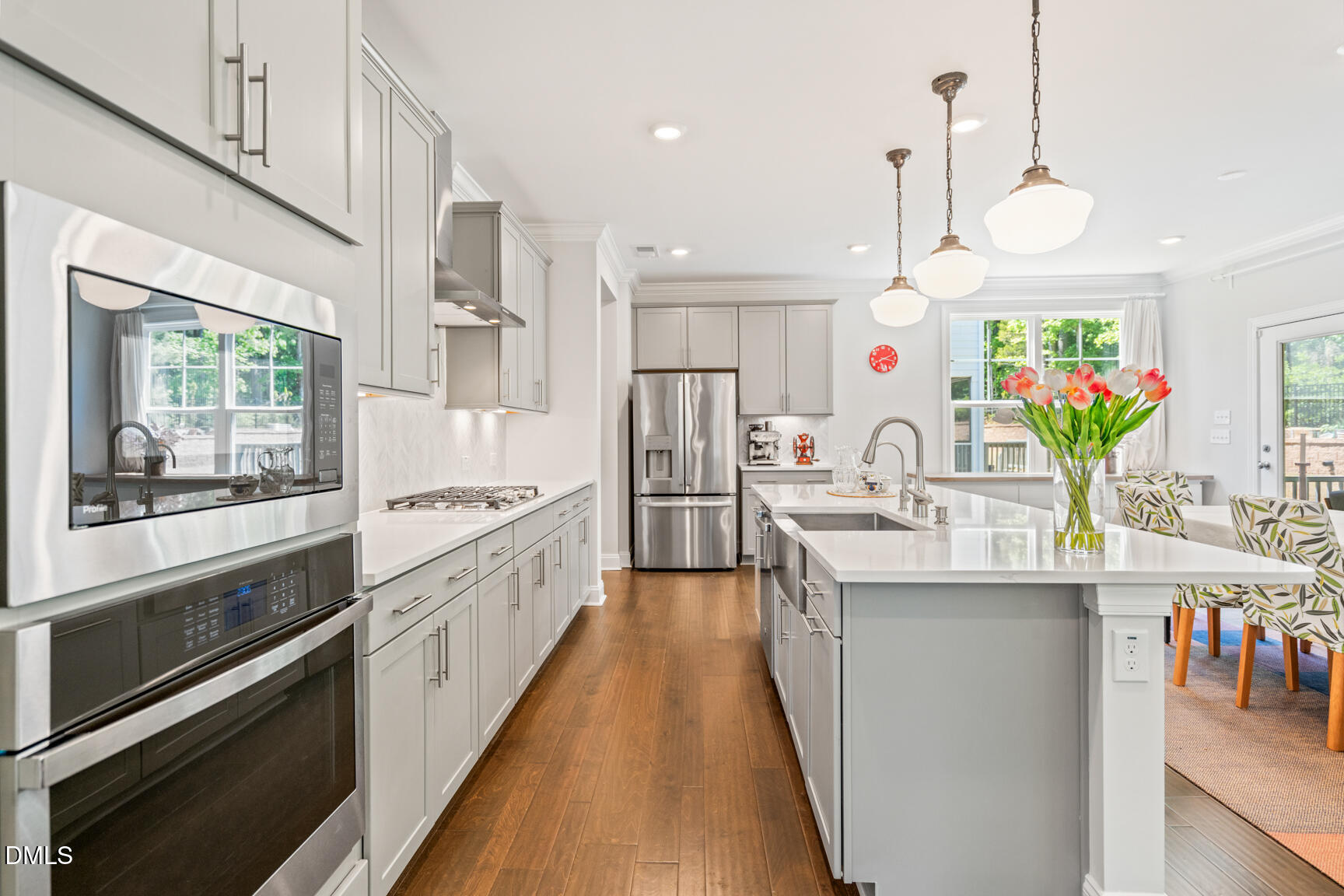2966 Rise And Shine Road Apex, NC 27502 - Photo 19 of 61 a large kitchen with lots of counter space sink and appliances
