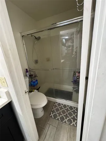 a view of a back yard from a balcony