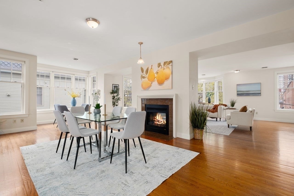 53 Winslow Road Brookline, MA 02446 - Photo 6 of 23 a view of a livingroom with furniture window and wooden floor