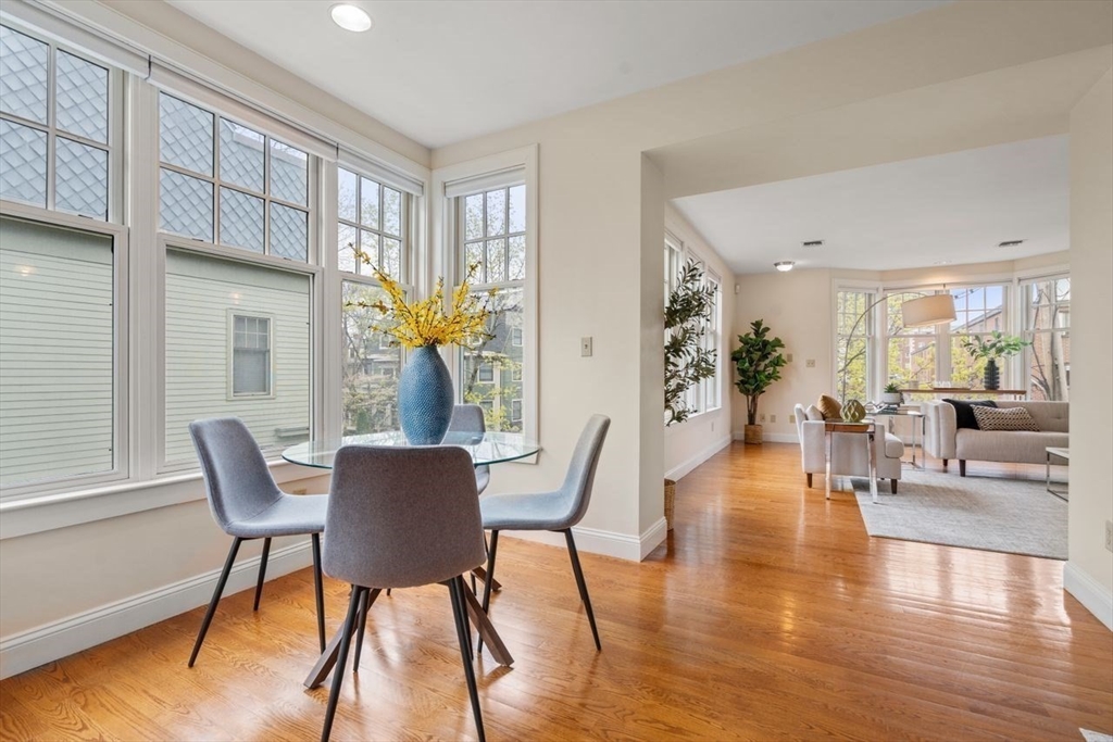 53 Winslow Road Brookline, MA 02446 - Photo 9 of 23 a dining room with furniture garden view and wooden floor