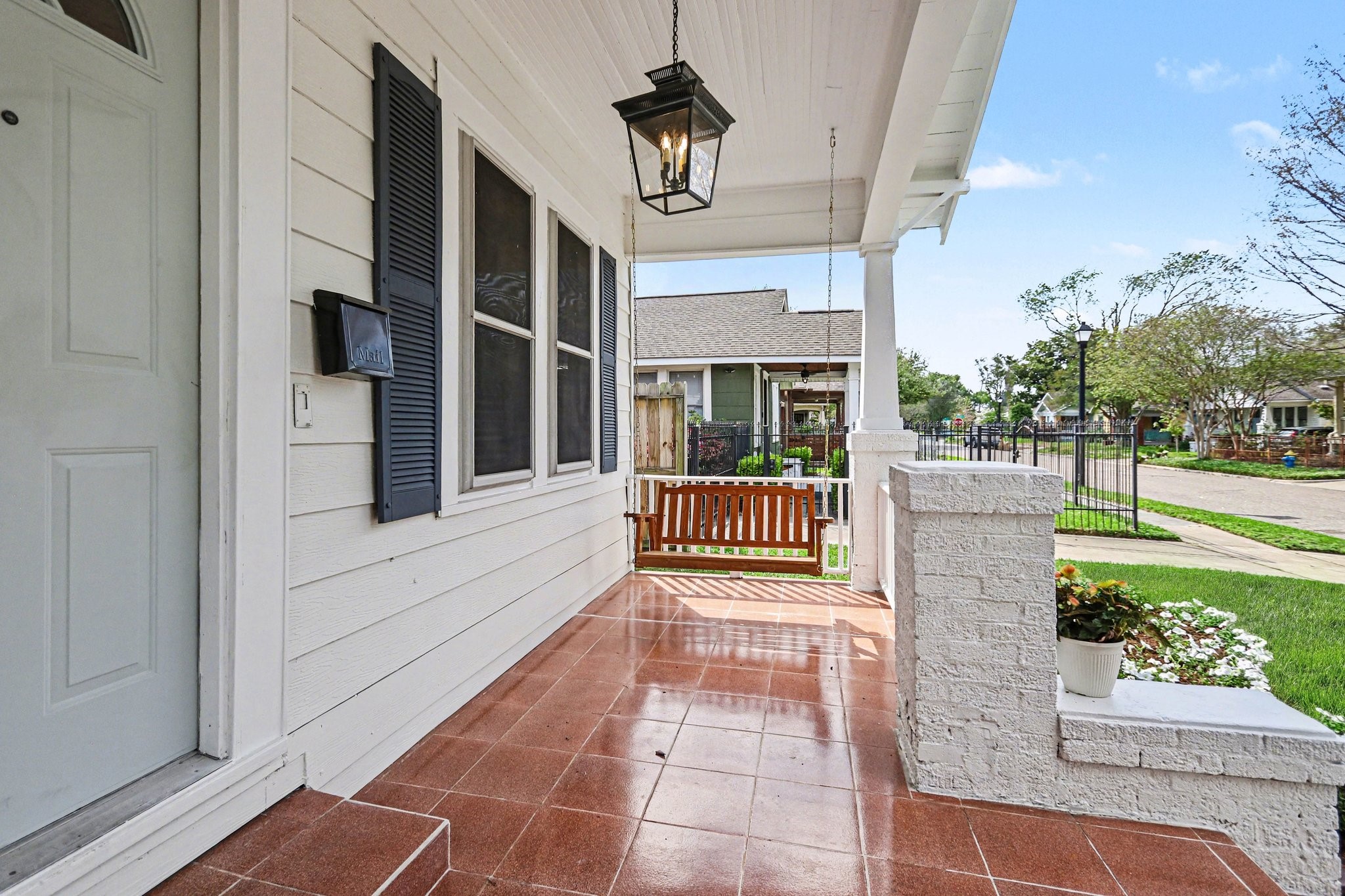 1118 Peddie Street Houston, TX 77009 - Photo 2 of 27 Relax on the welcoming front porch swing and enjoy peaceful neighborhood views.
