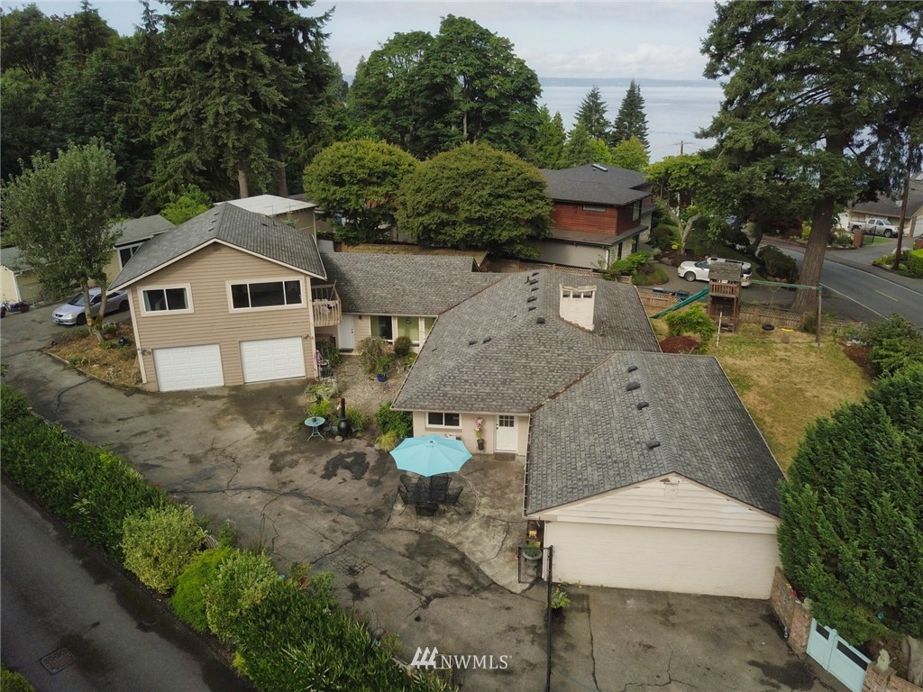 8112 Talbot Road Edmonds, WA 98026 - Photo 22 of 28 an aerial view of a house with a yard and large tree