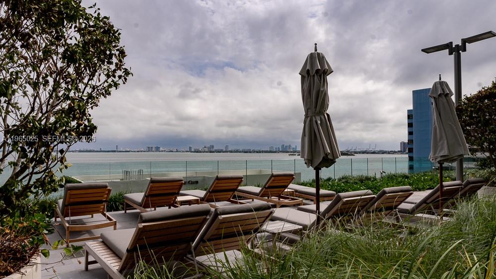 650 Northeast 32nd Street, Unit 2105 Miami, FL 33137 - Photo 32 of 61 a view of outdoor space with seating area and barbeque oven