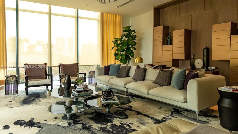 650 Northeast 32nd Street, Unit 2105 Miami, FL 33137 - Photo 38 of 61 a living room with furniture kitchen view and large windows