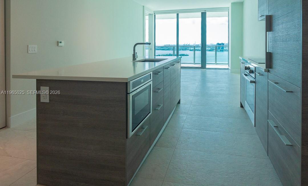 650 Northeast 32nd Street, Unit 2105 Miami, FL 33137 - Photo 4 of 61 a bathroom with a shower