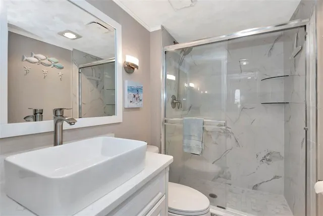 a bathroom with a sink vanity and a mirror