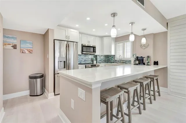 a view of a dining room and chandelier