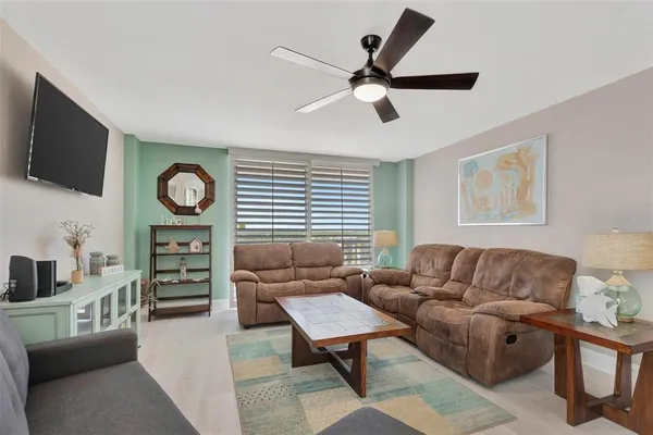 a kitchen with cabinets stainless steel appliances and a counter space