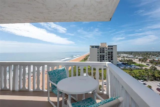 a view of building with yard