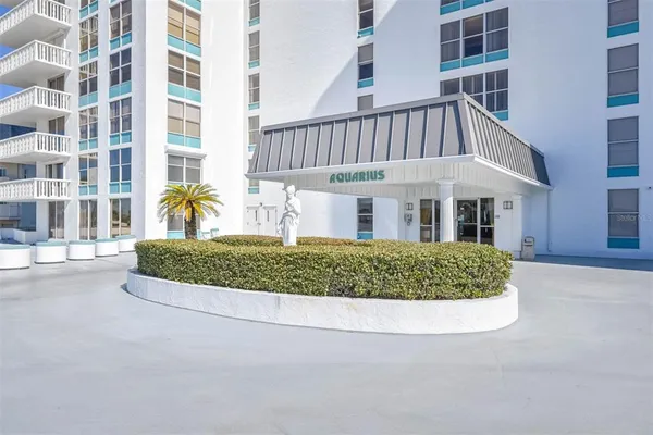 a view of a swimming pool and a buildings