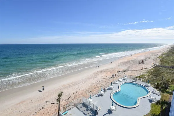a view of beach and ocean