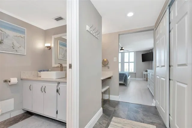 a bedroom with bed and window