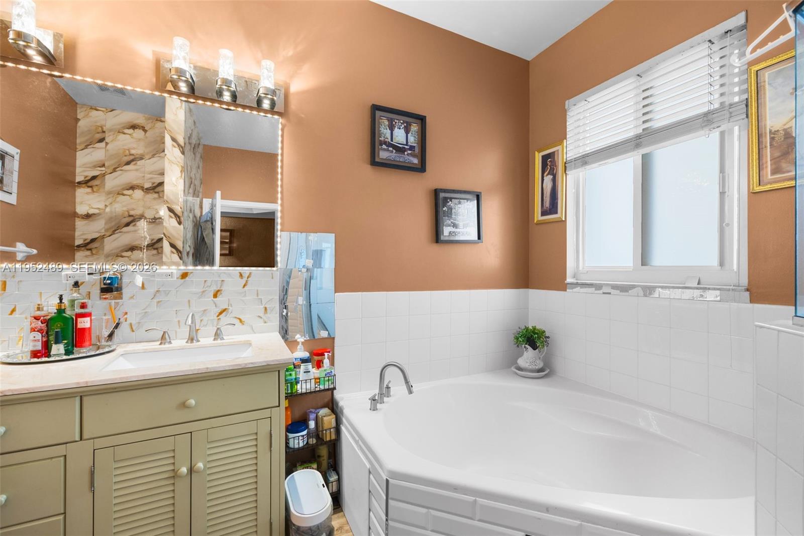3985 Northeast 15th Street Homestead, FL 33033 - Photo 27 of 67 a bathroom with a sink and a bathtub