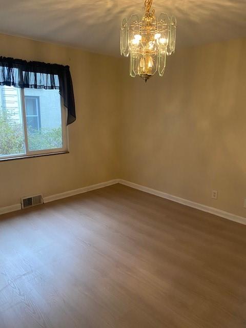 7025 Meade Street, Unit 1 Pittsburgh, PA 15208 - Photo 11 of 21 a view of a chandelier in big room