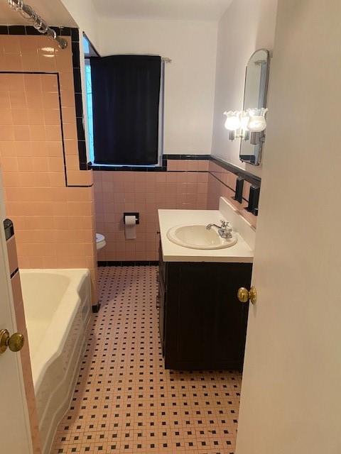 7025 Meade Street, Unit 1 Pittsburgh, PA 15208 - Photo 12 of 21 a bathroom with a sink and a mirror
