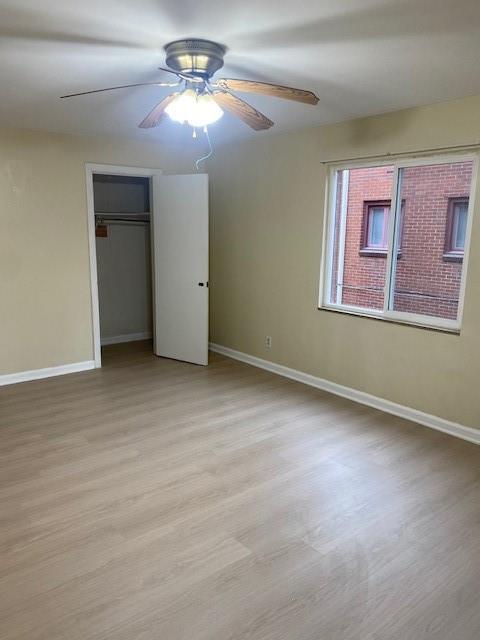 7025 Meade Street, Unit 1 Pittsburgh, PA 15208 - Photo 14 of 21 a view of a room with a ceiling fan and a window