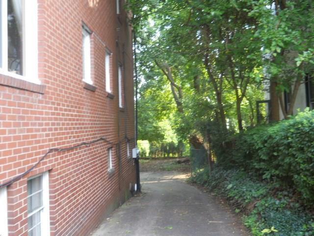 7025 Meade Street, Unit 1 Pittsburgh, PA 15208 - Photo 20 of 21 a view of a street with trees and bushes