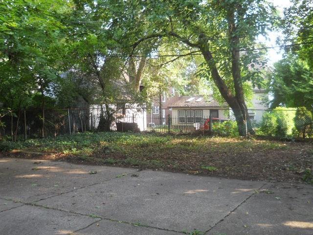 7025 Meade Street, Unit 1 Pittsburgh, PA 15208 - Photo 21 of 21 a view of a house with a tree in the background