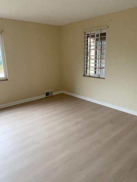 7025 Meade Street, Unit 1 Pittsburgh, PA 15208 - Photo 3 of 21 an empty room with a window