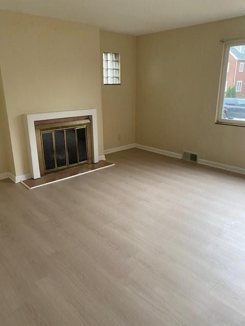 7025 Meade Street, Unit 1 Pittsburgh, PA 15208 - Photo 4 of 21 an empty room with windows