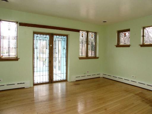 277 Gatesby Road Riverside, IL 60546 - Photo 7 of 15 a view of a room with wooden floor and window