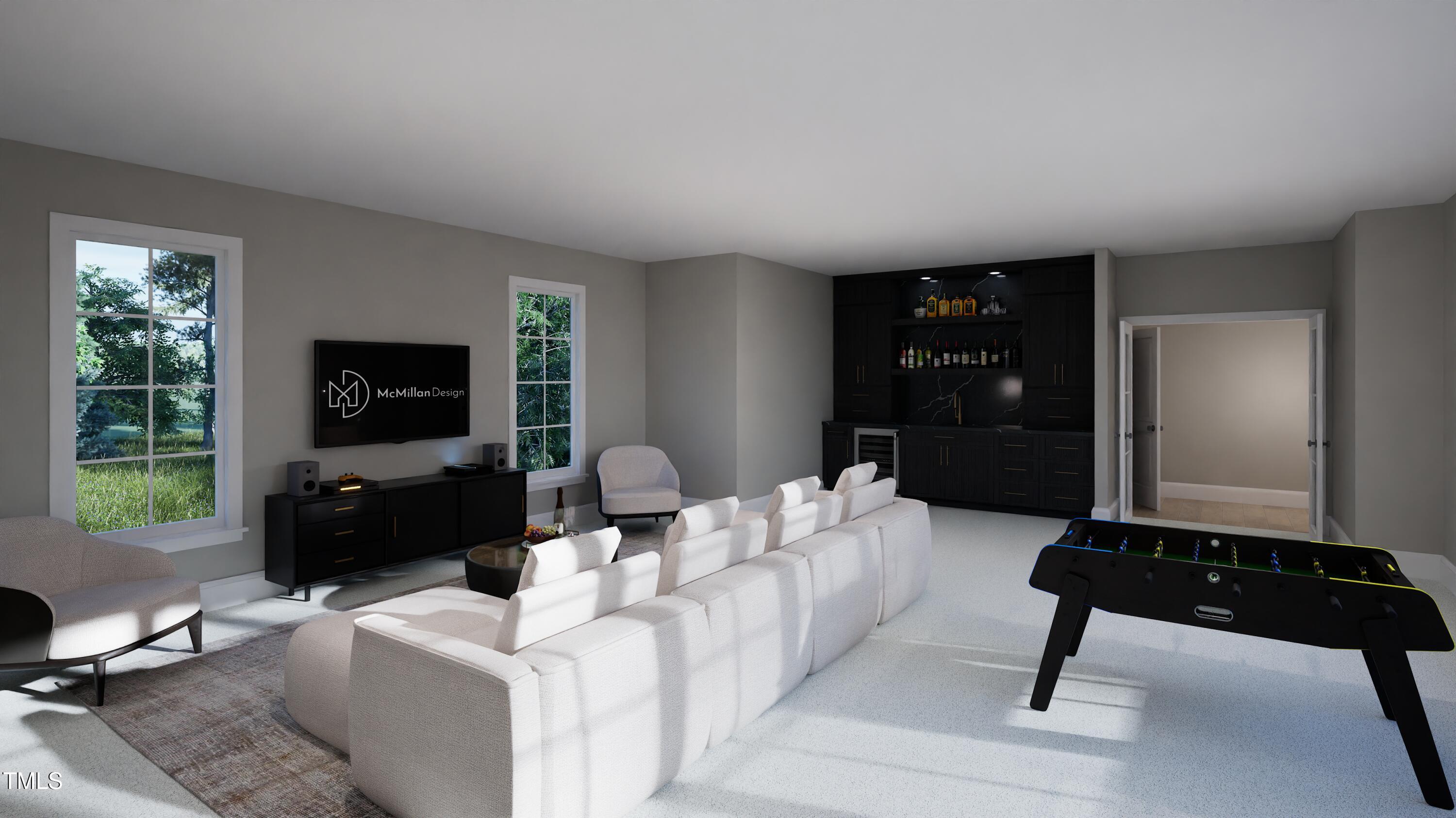 4112 Rockingham Street Raleigh, NC 27609 - Photo 34 of 67 a living room with furniture and a flat screen tv