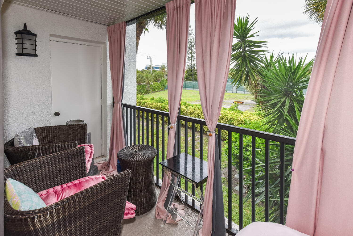 1605 Highway 1, Unit V4206 Jupiter, FL 33477 - Photo 19 of 30 a view of a porch with furniture