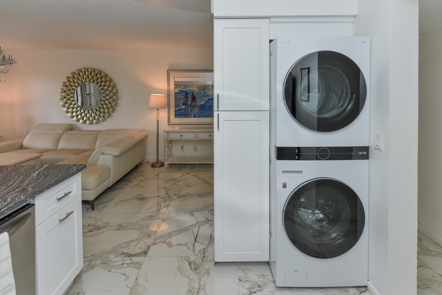 1605 Highway 1, Unit V4206 Jupiter, FL 33477 - Photo 9 of 30 a utility room with dryer and washer