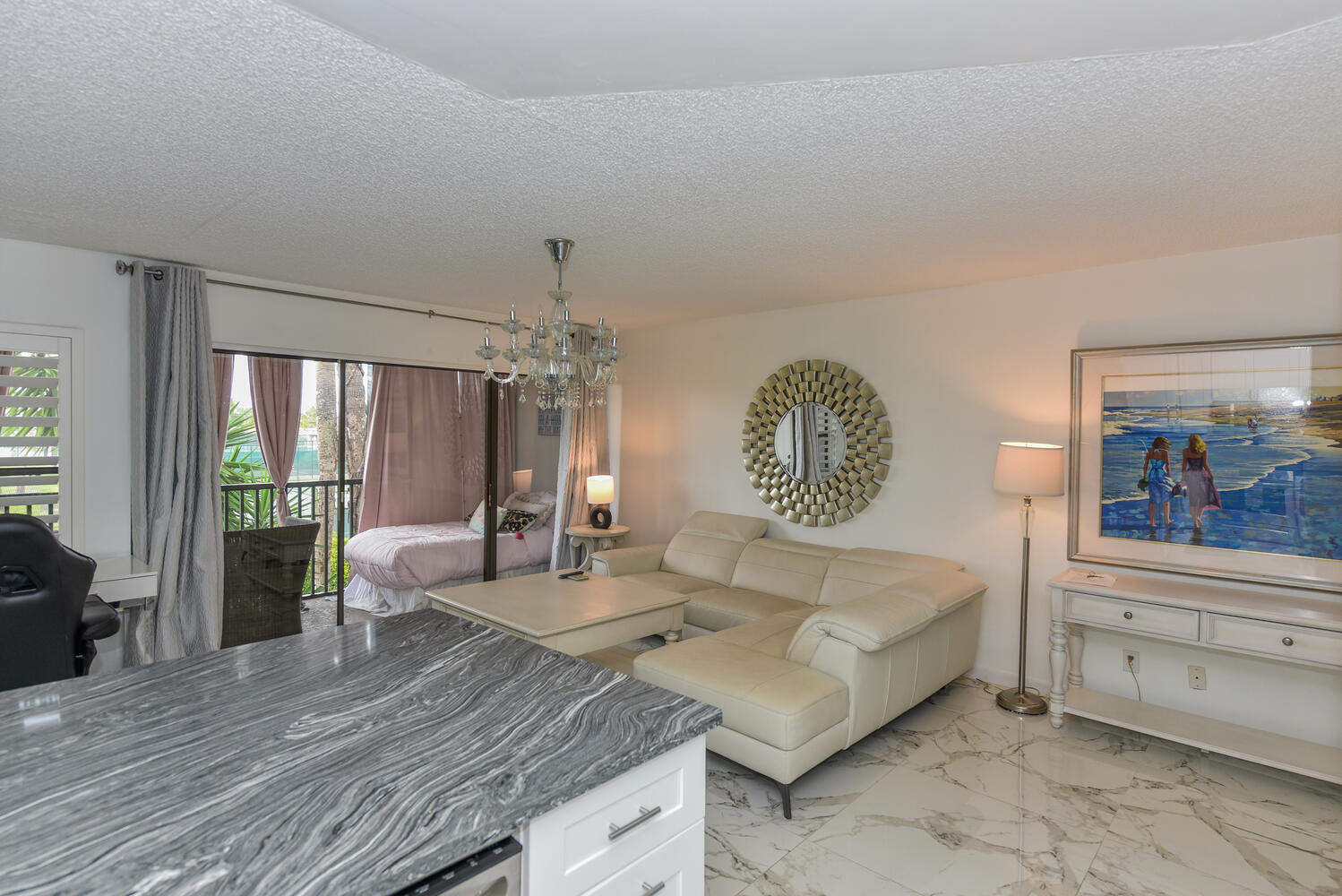 1605 Highway 1, Unit V4206 Jupiter, FL 33477 - Photo 10 of 30 a living room with furniture and a window