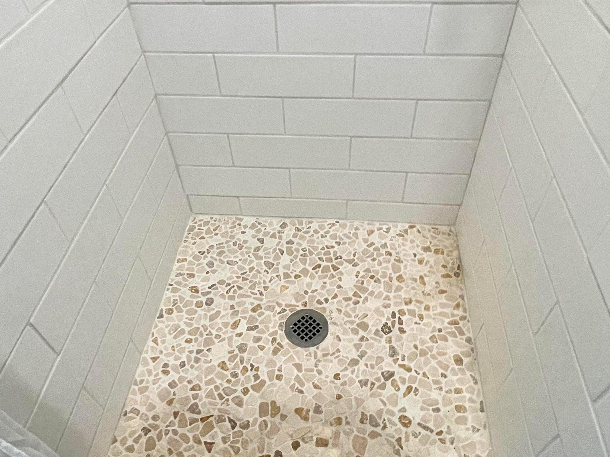 215 Pilgrim Spring Road, Unit G Wellfleet, MA 02667 - Photo 24 of 32 a bathroom with a shower