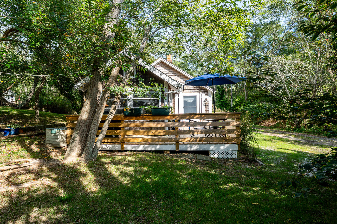 215 Pilgrim Spring Road, Unit G Wellfleet, MA 02667 - Photo 26 of 32 a view of a house with swimming pool